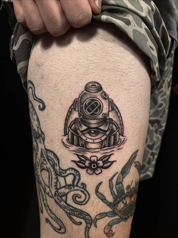 Diving helmet, tattooed by Cara