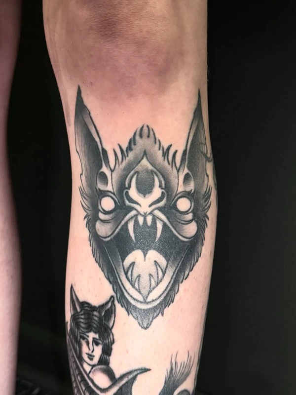 Bat and black cat, tattooed by Tevin
